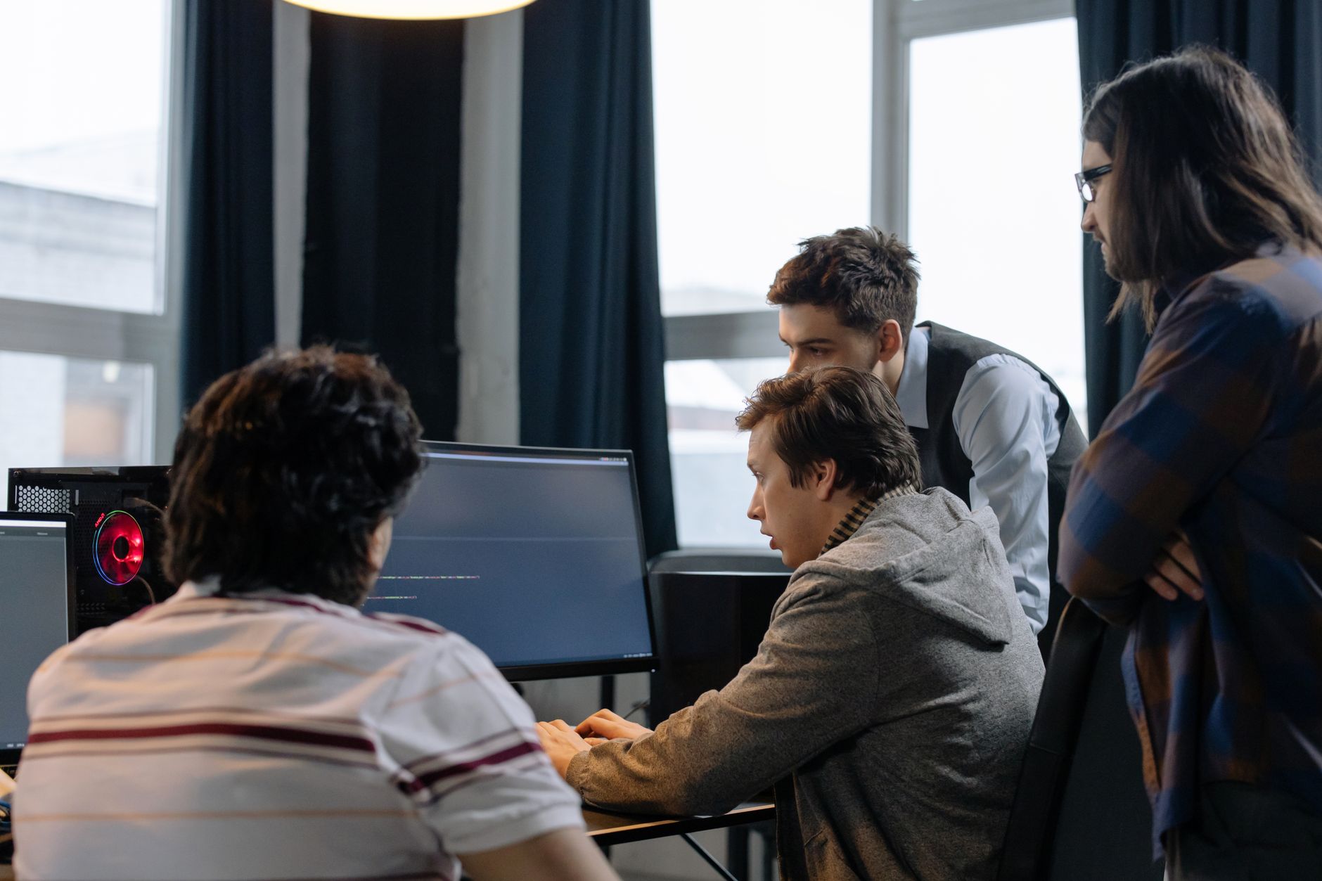 A team of software engineers collaborating on system architecture